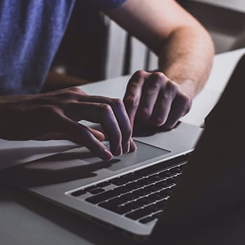 man at computer