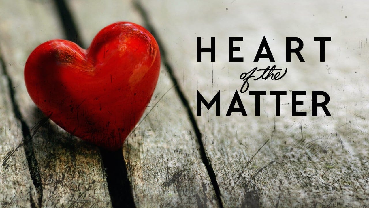Heart of the matter. a heart resting on wooden slats.